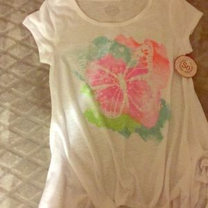 White shirt with a pink and green flower